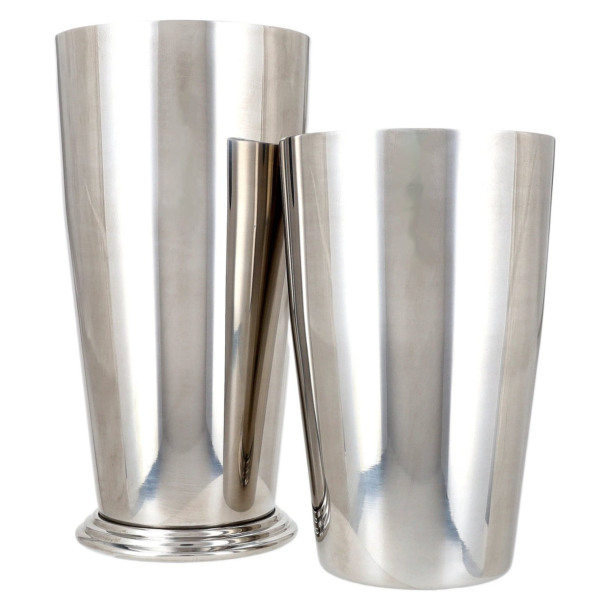 Cocktail shaker with a stainless steel bowl and a stepped base